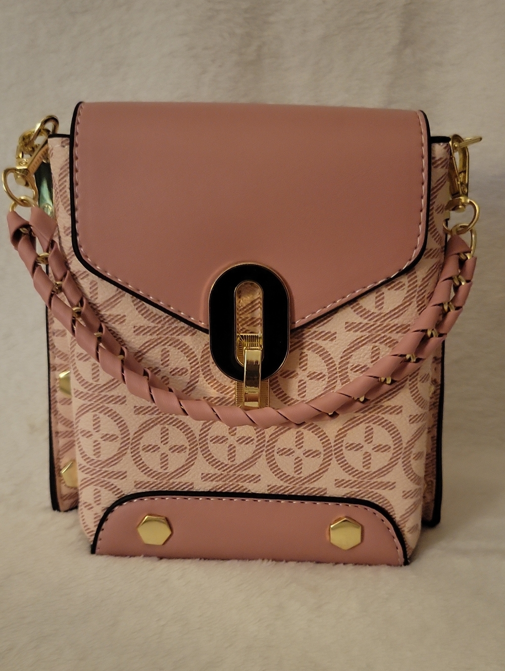 Structured Pink Crossbody Bag with Braided Handle and Gold Accents